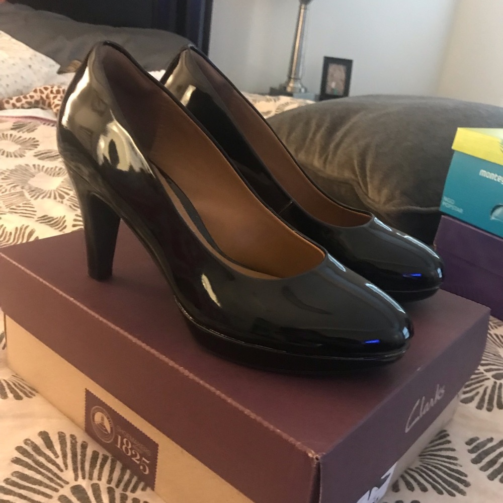 Clark’s patent leather pumps